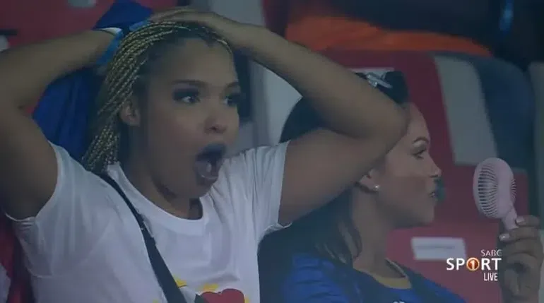 Cape Verdean women watch from the stands during the AFCON 2023 quarterfinal between South Africa and Cape Verde