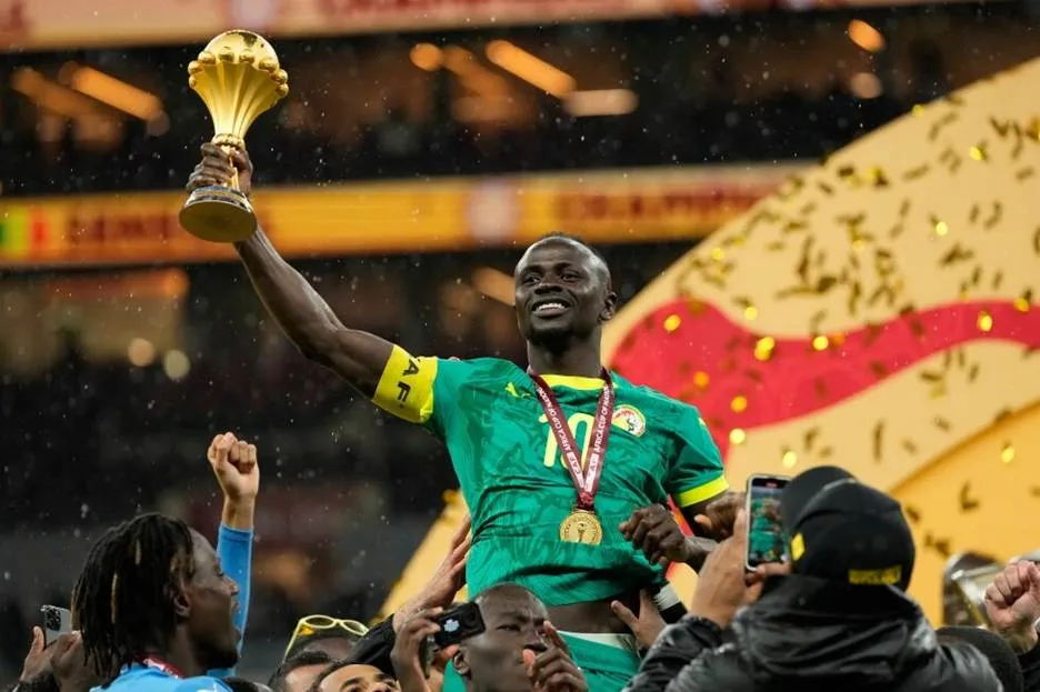 Sadio Mané pictured with the AFCON trophy, a title now under dispute following CAF’s decision to overturn the final result